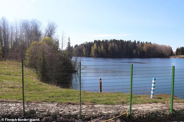 Finland 's £300 million fence along the Russian border installed as a security measure after Putin's invasion of Ukraine