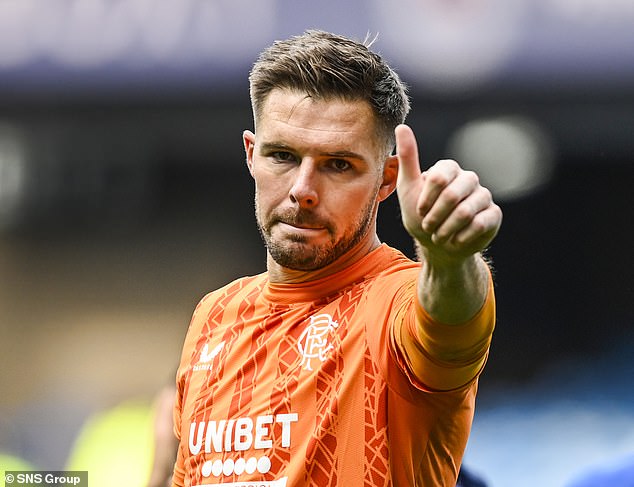 Butland gives the thumbs-up to supporters at full-time at Ibrox