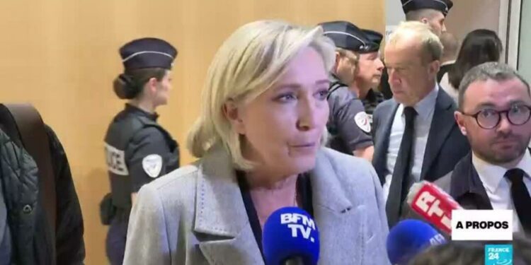 A Le Pen conviction in fake EU jobs case could weigh on far-right support, researcher says