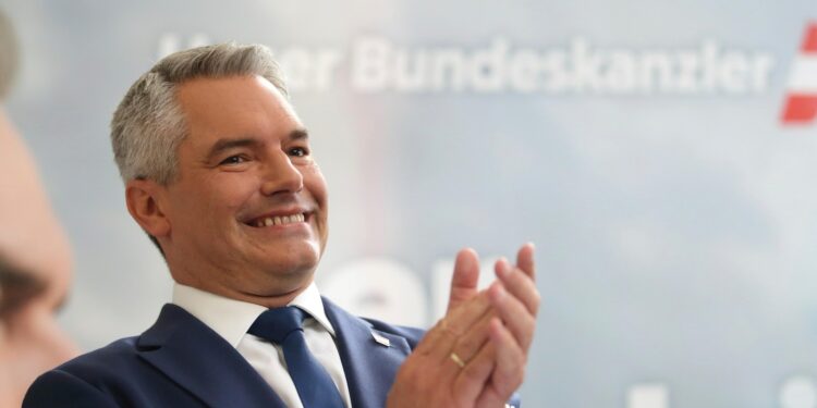 Austrian far-right party hopes for its first national election win in a close race