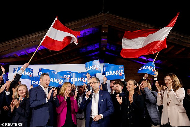 Herbert Kickl speaks at a rally as projections show his Freedom Party have won the most votes at the general election