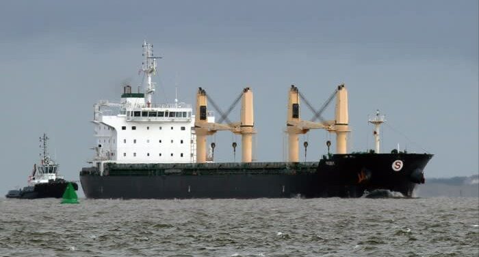 Damaged ship carrying explosive cargo anchors off UK coast