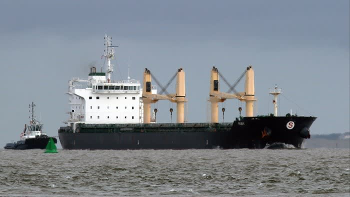 Damaged ship carrying explosive cargo anchors off UK coast