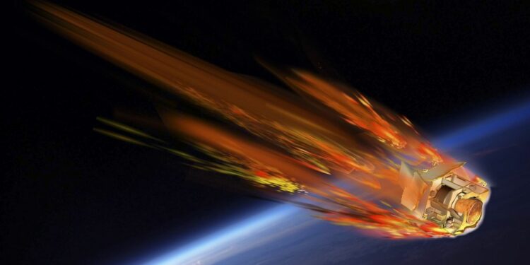 A piece of space debris streaks with flame as it burns up in the atmosphere.