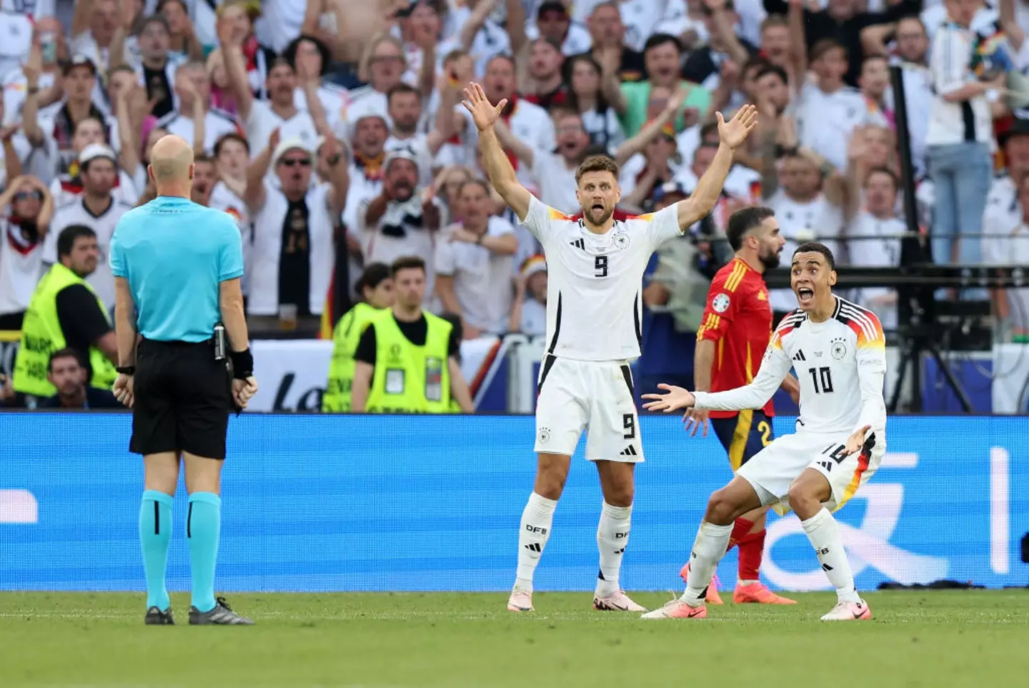 Germany were outraged after Cucurella committed a handball in the box at Euro 2024. (Image: Getty)