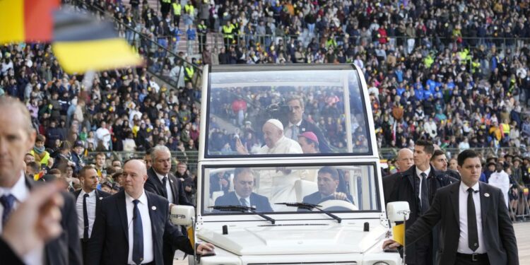 Pope wraps troubled visit to Belgium by beatifying 17th century mystic during sunny stadium Mass