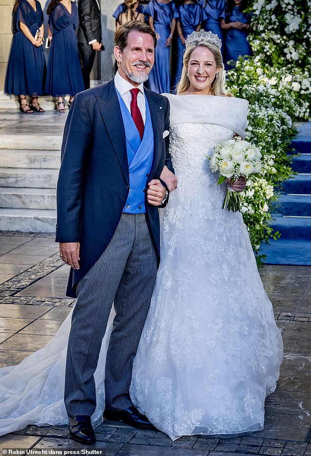 Princess Theodora of Greece pictured arriving at her wedding to LA-based lawyer Matthew Kumar. She stands next to her older brother Crown Prince Pavlos