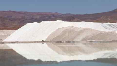 Wide view of brine piles drying in an evaporation pond