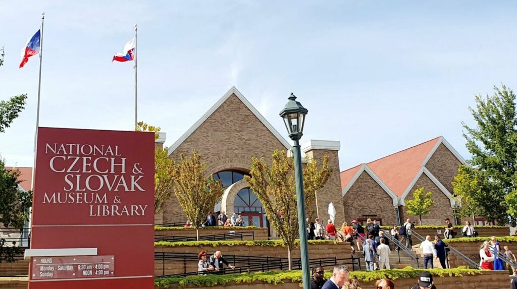 Slovak artist’s immigrant figurines debut in Iowa’s new clock tower