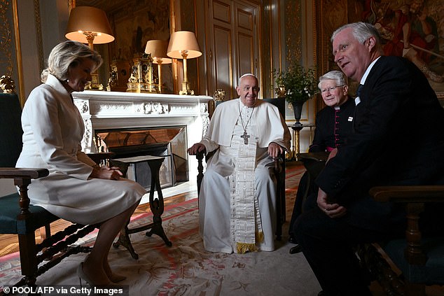 King Philippe, 64, and Queen Mathilde , 51, looked the pinnacle of elegance today as they met with the Pope for photographs, at the Castle of Laeken, near Brussels during his four-day visit