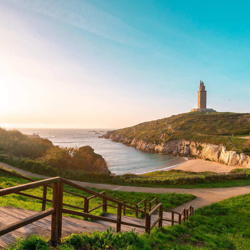 Wooden Stairway Leading Town To The Tower Of Hercules In A Coruna, Spain