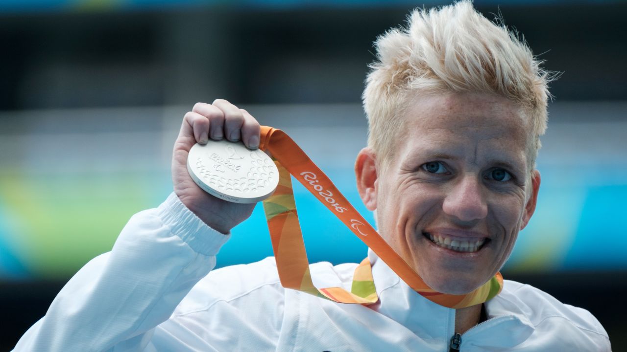 Belgium's Marieke Vervoort reacts on the podium after receiving the silver medal for the women's 400 m (T52) of the Rio 2016 Paralympic Games at the Olympic Stadium in Rio de Janeiro on September 10, 2016. / AFP / YASUYOSHI CHIBA        (Photo credit should read YASUYOSHI CHIBA/AFP/Getty Images)