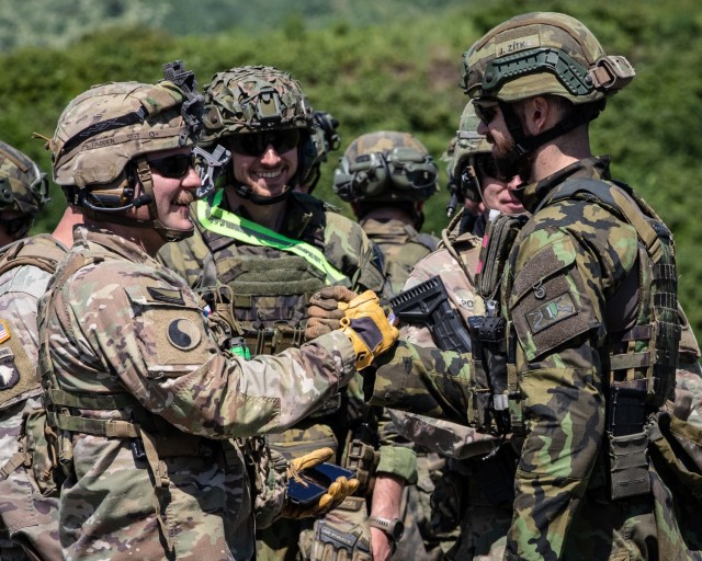 Virginia Army National Guard Soldiers assigned to the Charlottesville-based Alpha Company, 3rd Battalion, 116th Infantry Regiment, operating as Task Force St. Lo, conduct fire and movement drills with the Czech 72nd Mechanised Battalion at...