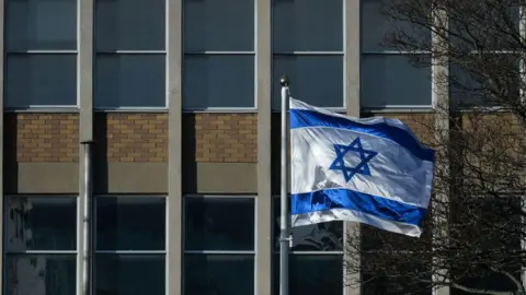 Getty Images A view of the Israeli national flag in front of the Israeli Embassy in Dublin seen during Level 5 Covid-19 lockdown