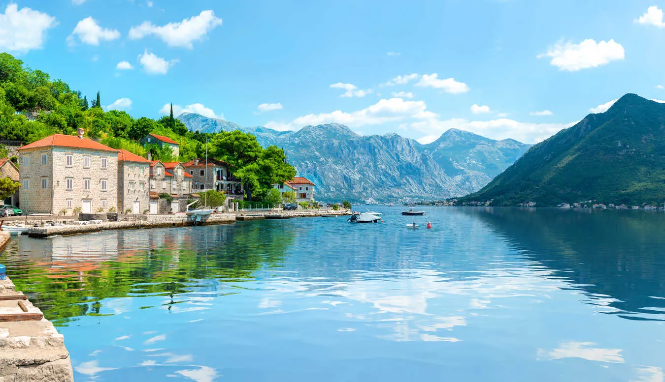 The Bay of Kotor in Montenegro, surrounded by majestic mountains and tranquil waters. 