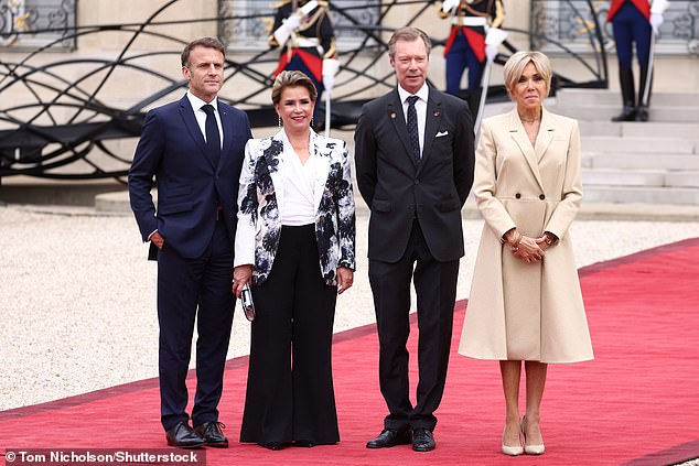 Pictured: Maria Teresa, Grand Duchess of Luxembourg and Henri, Grand Duke of Luxembourg with the Macrons