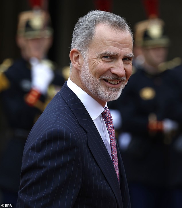 Pictured: King Felipe VI of Spain arrived at a reception hosted by French President Macron today