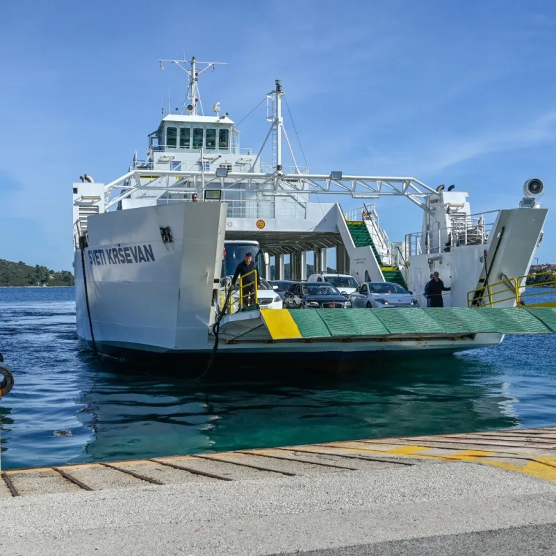 Car ferry pulling into Korcula town port, Croatia