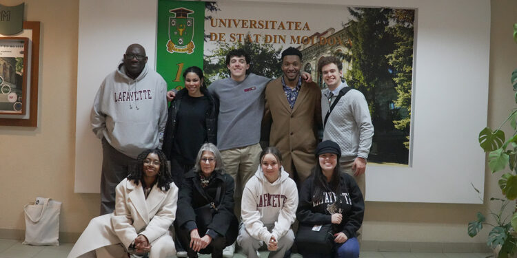 Students smile in a group