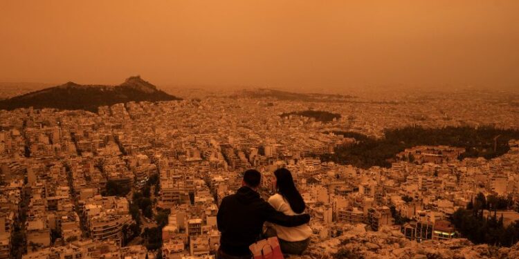 Athens dust clouds sweep in from the Sahara shrouding the city in orange haze