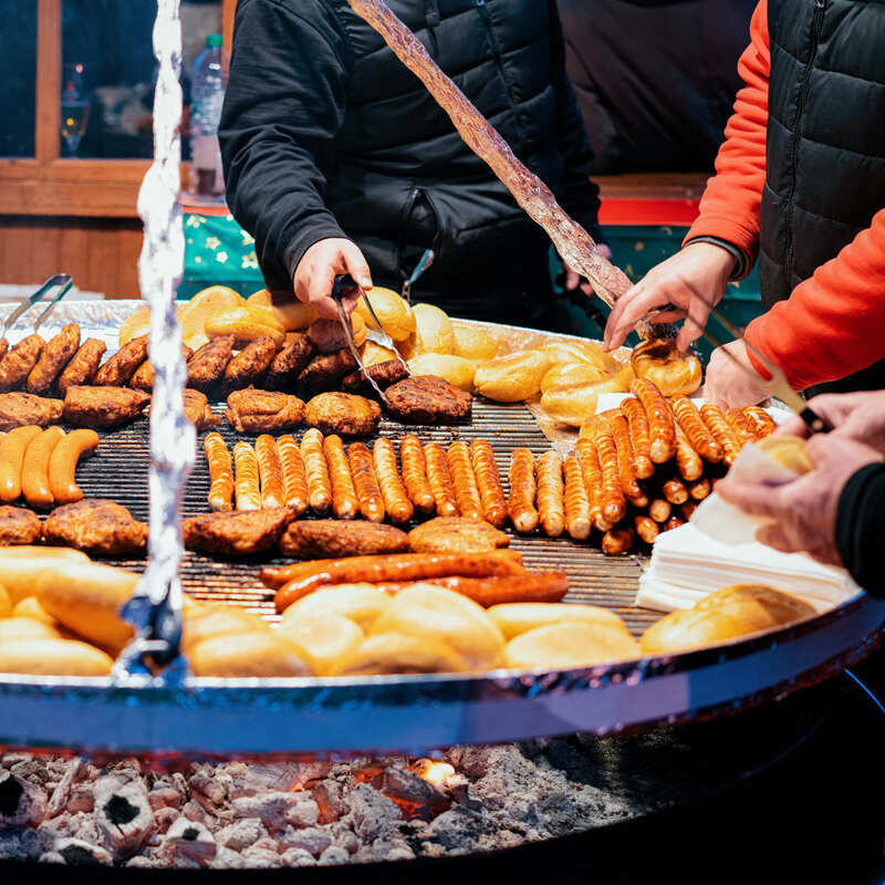 Sausage Being Sold In A Christmas Market In Cologne, Germany