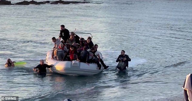 The couple initially thought it was a tourist boat coming into the Bay Area, but quickly realised it was full of migrants