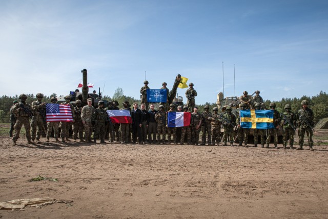 U.S. Soldiers and NATO allies complete a historic wet-gap crossing operation as part of Defender Europe 22 held at Nowogród, Poland, May 19, 2022. Defender Europe 2022 is a series of U.S. Army Europe and Africa multinational training exercises in...