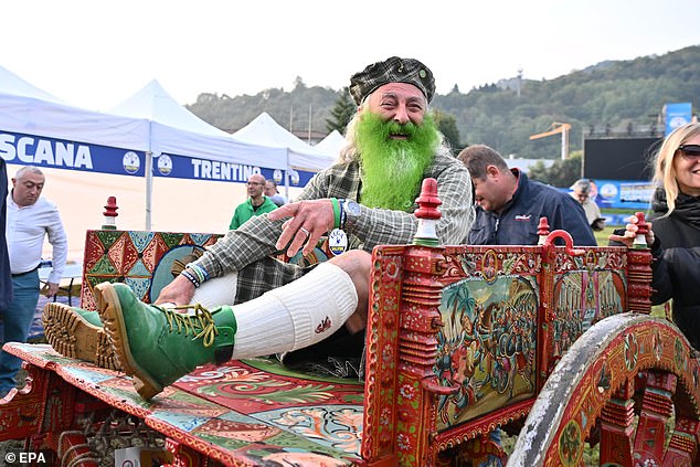 The rally - held annually in Pontida near Bergamo, Italy - saw revellers enjoying sausages and plenty of beer as they listened to right-wing leaders from across the continent spout anti-migrant rhetoric