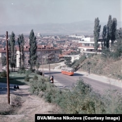 A tram winds through the foothills of Vitosha on its way toward central Sofia in 1970. The St. Alexander Nevsky Cathedral can be seen in the upper left background.