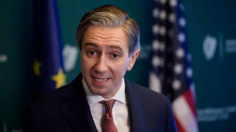 Pa Taoiseach Simon Harris speaks to the media during a press conference at DuPont Circle Hotel, in Washington DC, US. Picture date: Wednesday October 9, 2024. 