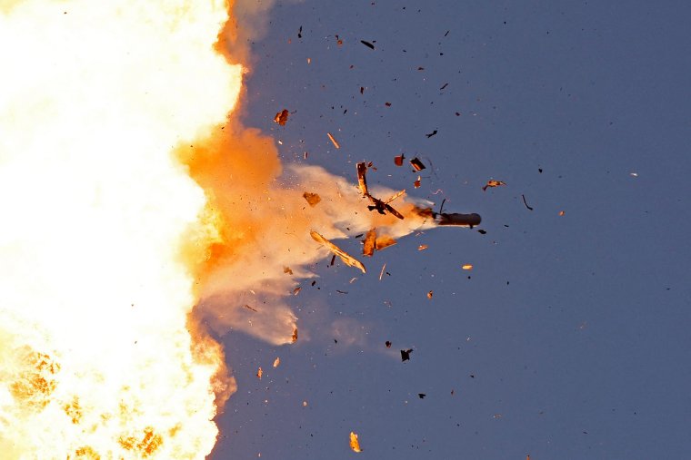 TOPSHOT - This photo taken from a position in northern Israel shows a Hezbollah UAV intercepted by Israeli air forces over north Israel on August 25, 2024. The Israeli military announced early August 25, 2024 that it was conducting pre-emptive strikes in Lebanon after detecting preparations for 