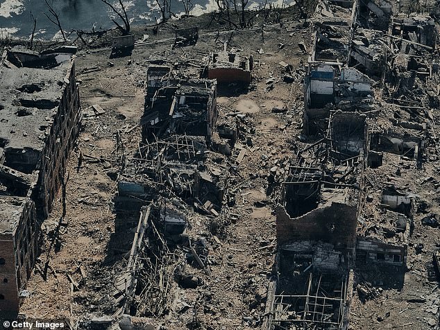 An aerial view shows the destroyed city of Vovchansk in the Kharkiv Region near the border with Russia, on October 2, 2024 in Vovchansk, Ukraine