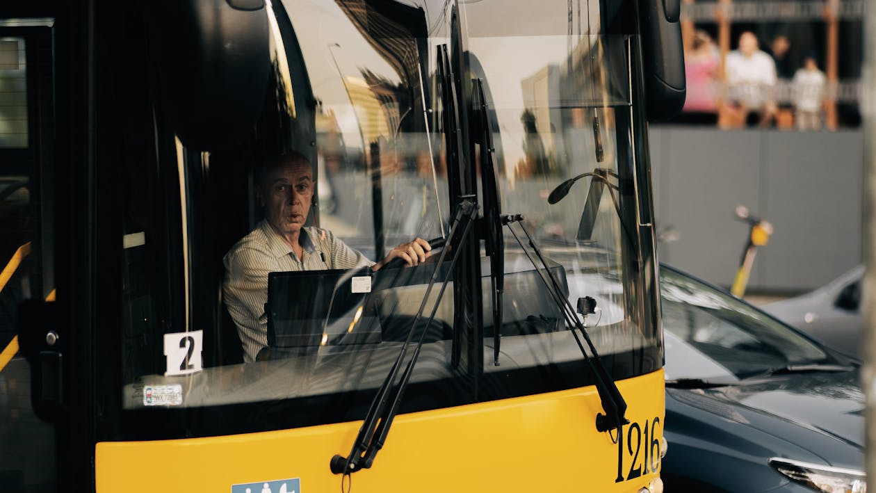 Man driving a bus