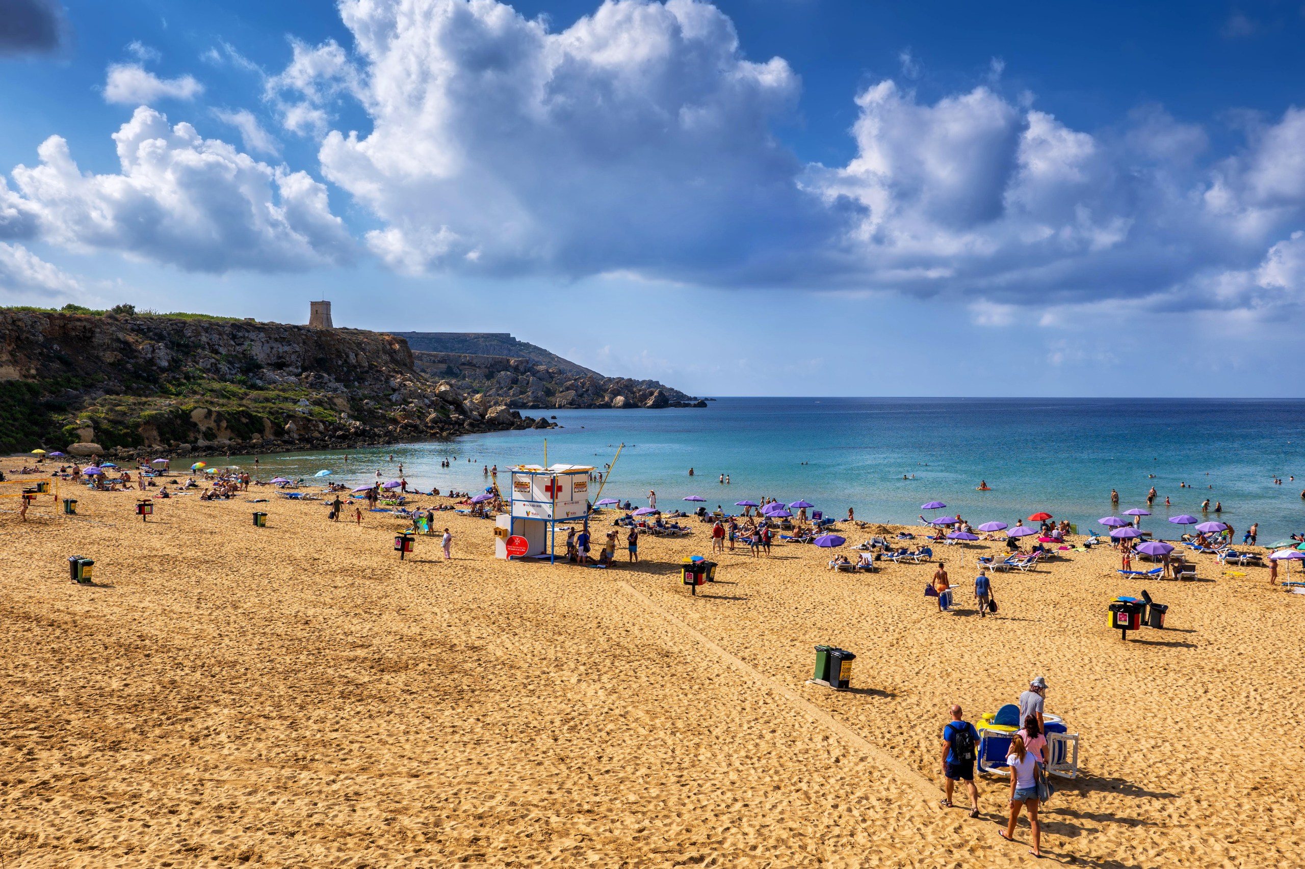 Visitors enjoy a day on the sands of Golden Bay