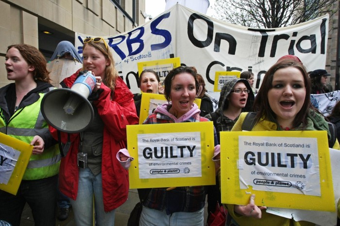 Protesters march outside the RBS annual meeting in 2008