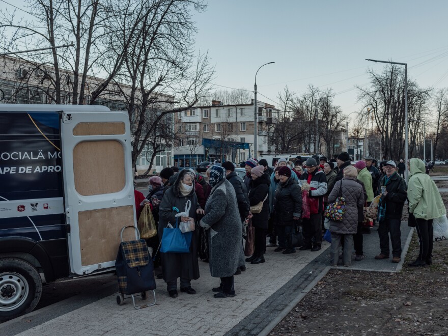 A local charity hands out bread and pasta in Chișinău, Moldova, Dec. 19, 2023. Inflation brought on by the war in Ukraine and Russia’s economic manipulation has had a disproportionate impact on poorer Moldovans.