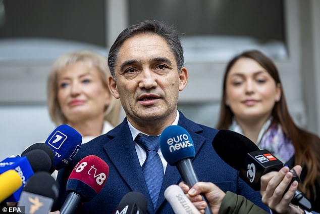 The former Prosecutor General of Moldova and presidential candidate, Alexandr Stoianoglo speaks to media in front of polling station after voting in Chisinau, Moldova, 20 October 2024