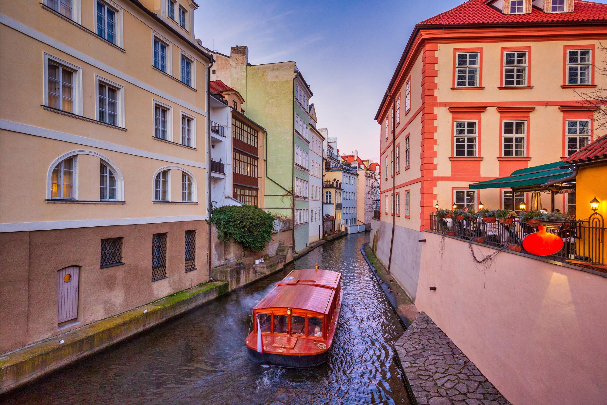 Historic houses along the Vltava creek called Certovka, Lesser Town in Prague, Czech Republic, Europe.