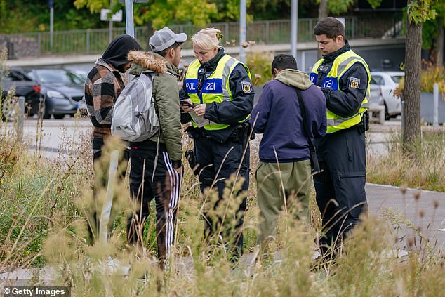 German police check people arriving from France at the German-French border on September 16, 2024