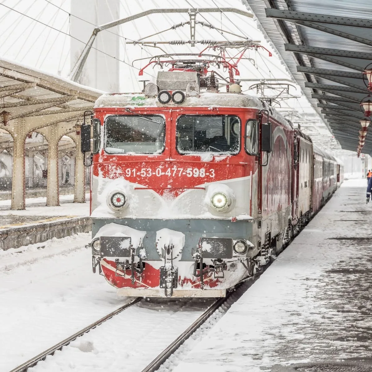 Train Leaving The Central Station In Bucharest, Romania During Winter