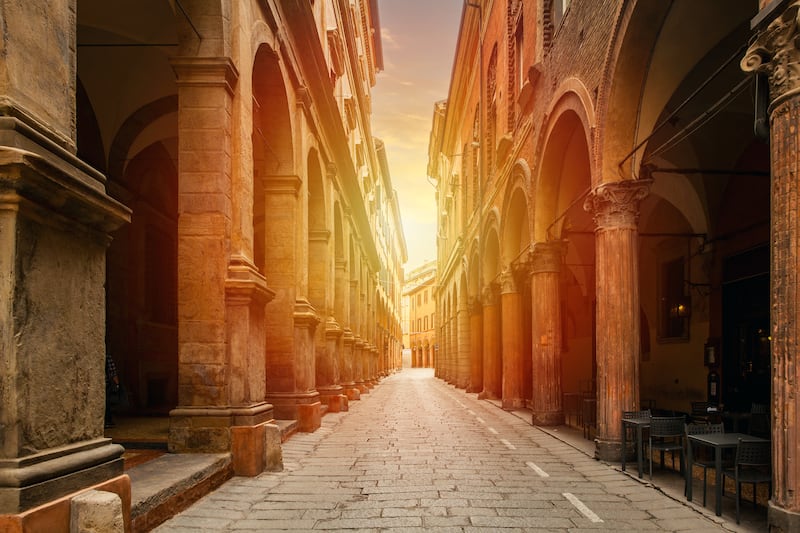 Sunset on a traditional street in Bologna. Photograph: muratkoc/Getty Images