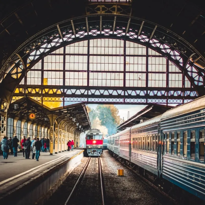 A train pulling into an unnamed European train station