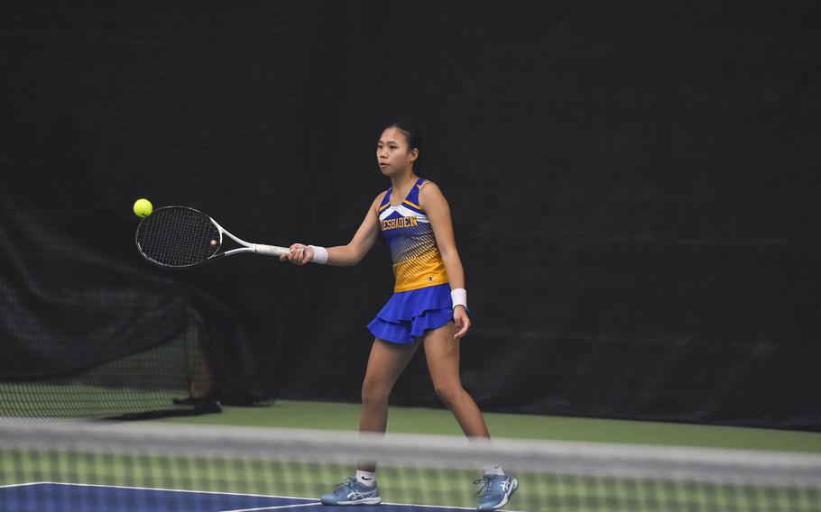 Isabella Na gets set to hit the ball.