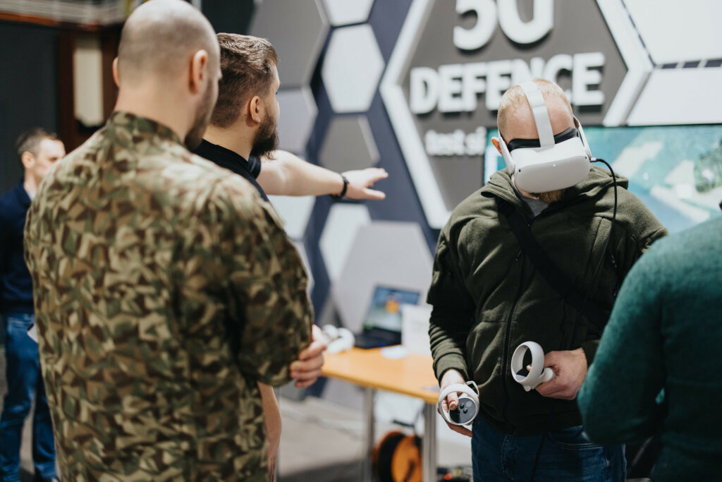 Personnel testing virtual reality medical trauma simulator for soldiers