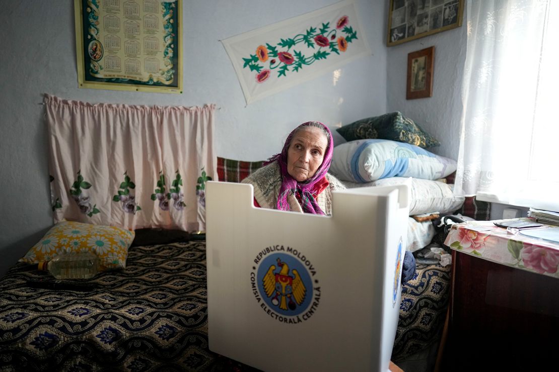 A Moldovan woman casts her vote in a mobile ballot box in Hrusevo on Sunday.