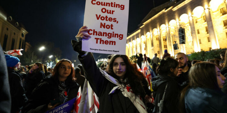 Protests erupt in Georgia after contested vote as Hungary’s Orban visits