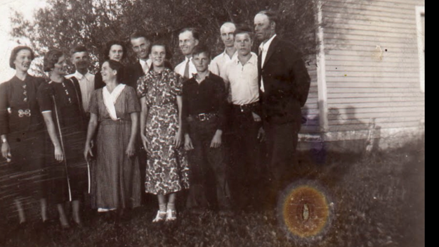 MaryJo Kacvinski's grandparents Steve and Mary and their ten children. MaryJo's dad, Joe, is second from the right.