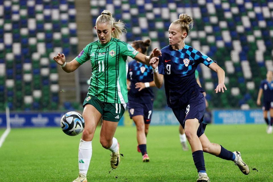 Northern Ireland's Danielle Maxwell holds off Croatia's Ivana Rudelic