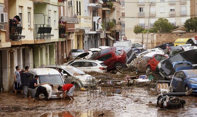 Valencia floods: Spain’s deadliest floods in decades kill at least 64 people