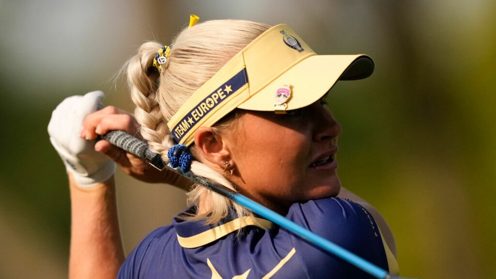 Europe's Charley Hull hits from the second tee during a Solheim Cup golf tournament singles match at the Robert Trent Jones Golf Club, Sunday, Sept. 15, 2024, in Gainesville, VA. (AP Photo/Matt York)